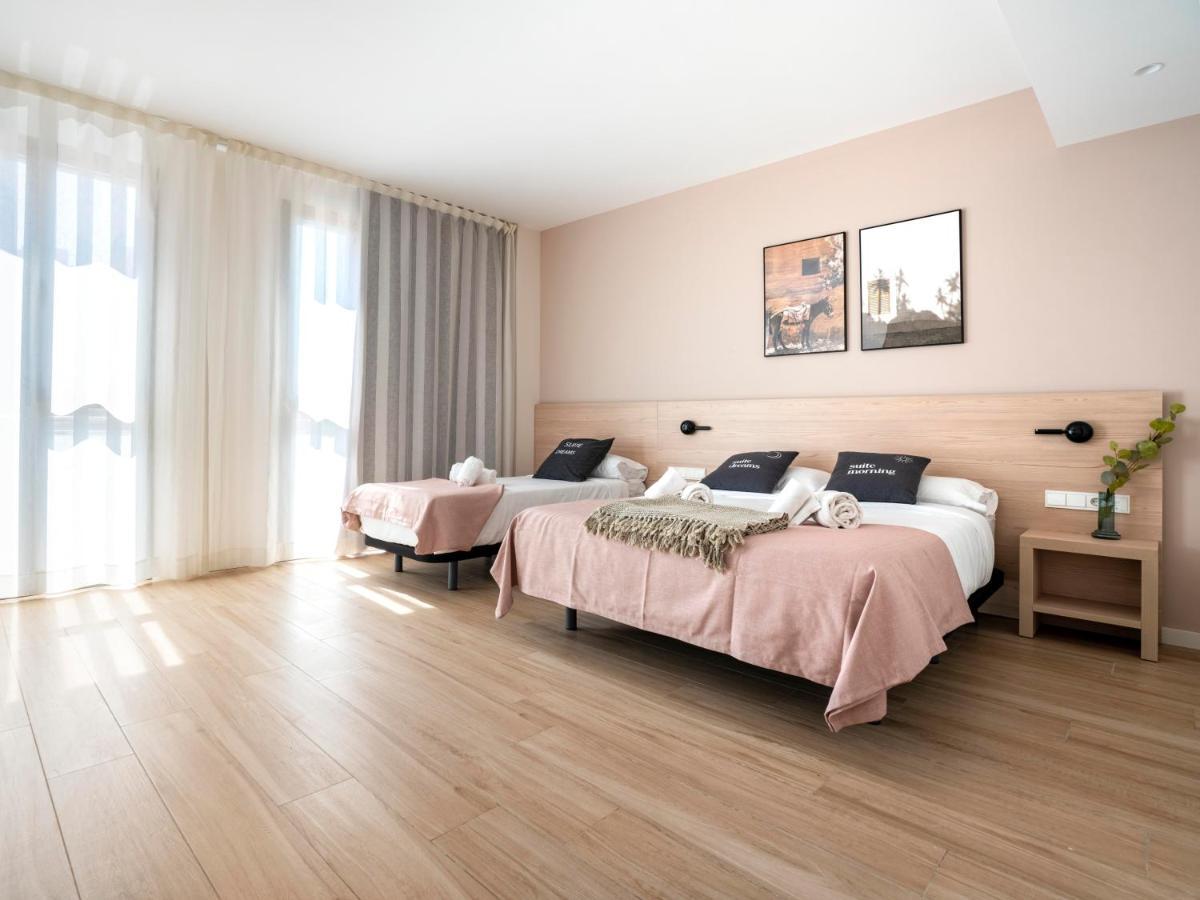 Dreibettzimmer mit Balkon